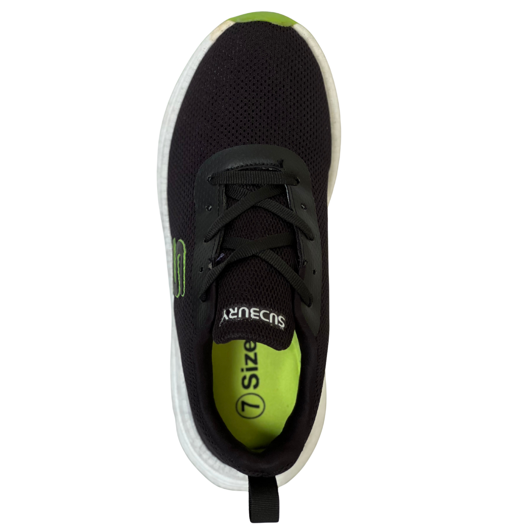 Black and green sneaker with visible brand name on a white background