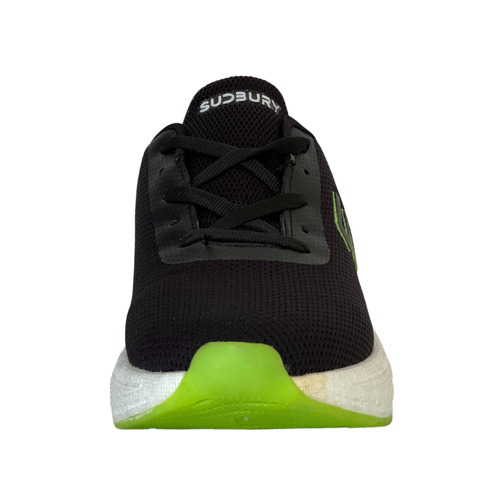 Black sneaker with green sole on a white background