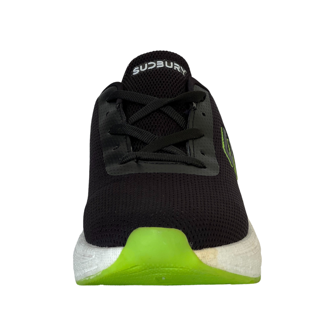 Black sneaker with green sole on a white background