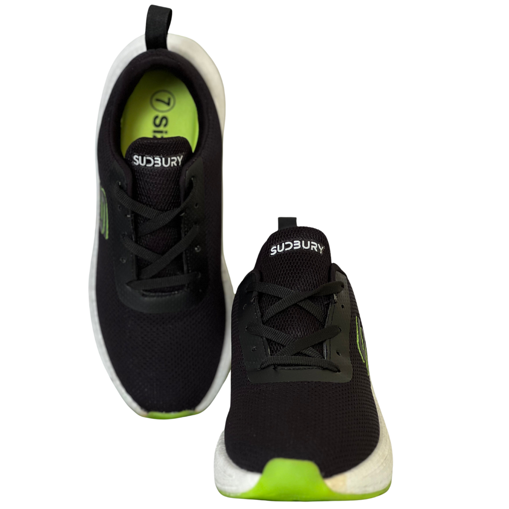 Black and green athletic shoes with 'Sudbury' branding on a white background