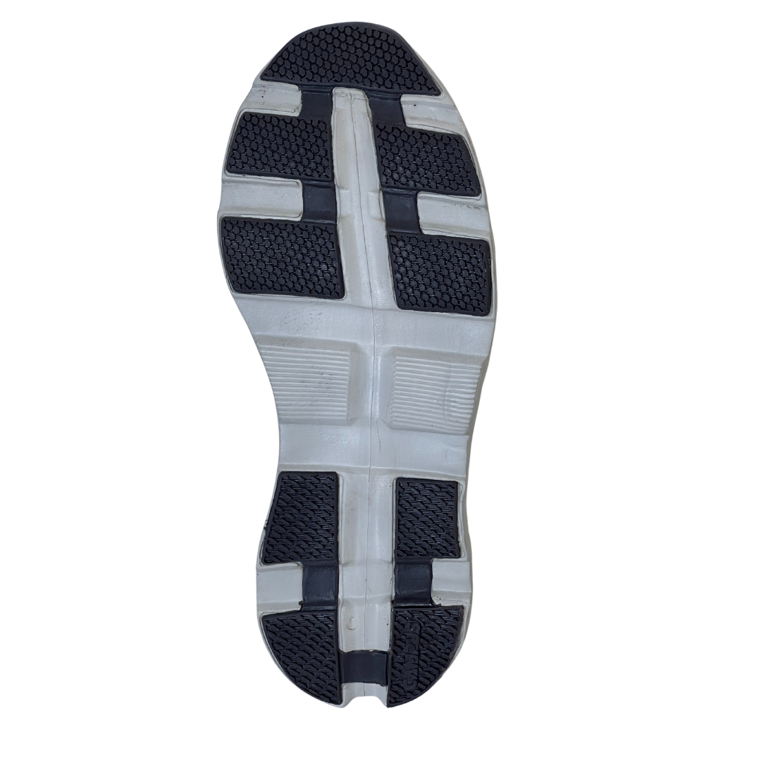 Sole of a shoe with tread pattern on a white background