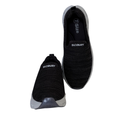 Black slip-on shoes with 'Sudbury' branding on a white background