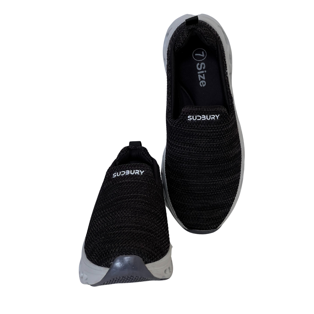 Black slip-on shoes with 'Sudbury' branding on a white background